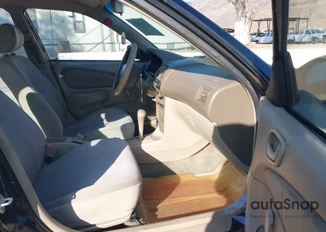 1998 Toyota Corolla Ve from USA, damaged, VIN 1NXBR12E1WZ111604